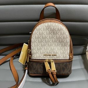 Michael Kors XS Rhea Zip Messenger Backpack